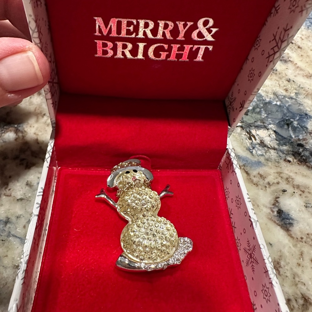 Elegant Silver and Gold Snowman Brooch